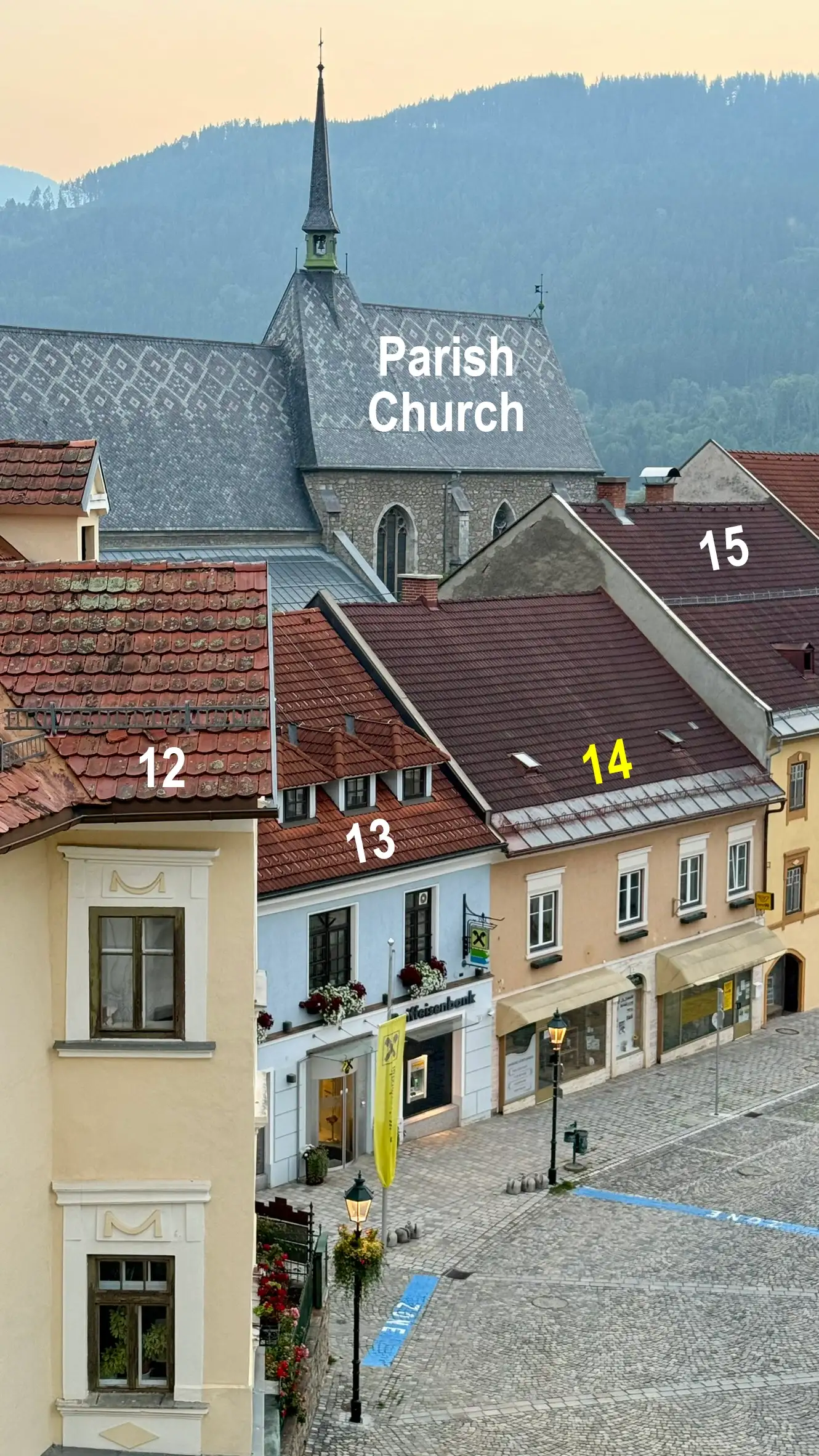 Foreground: Hauptplatz 12, 13, 14, 15; background: parish church
