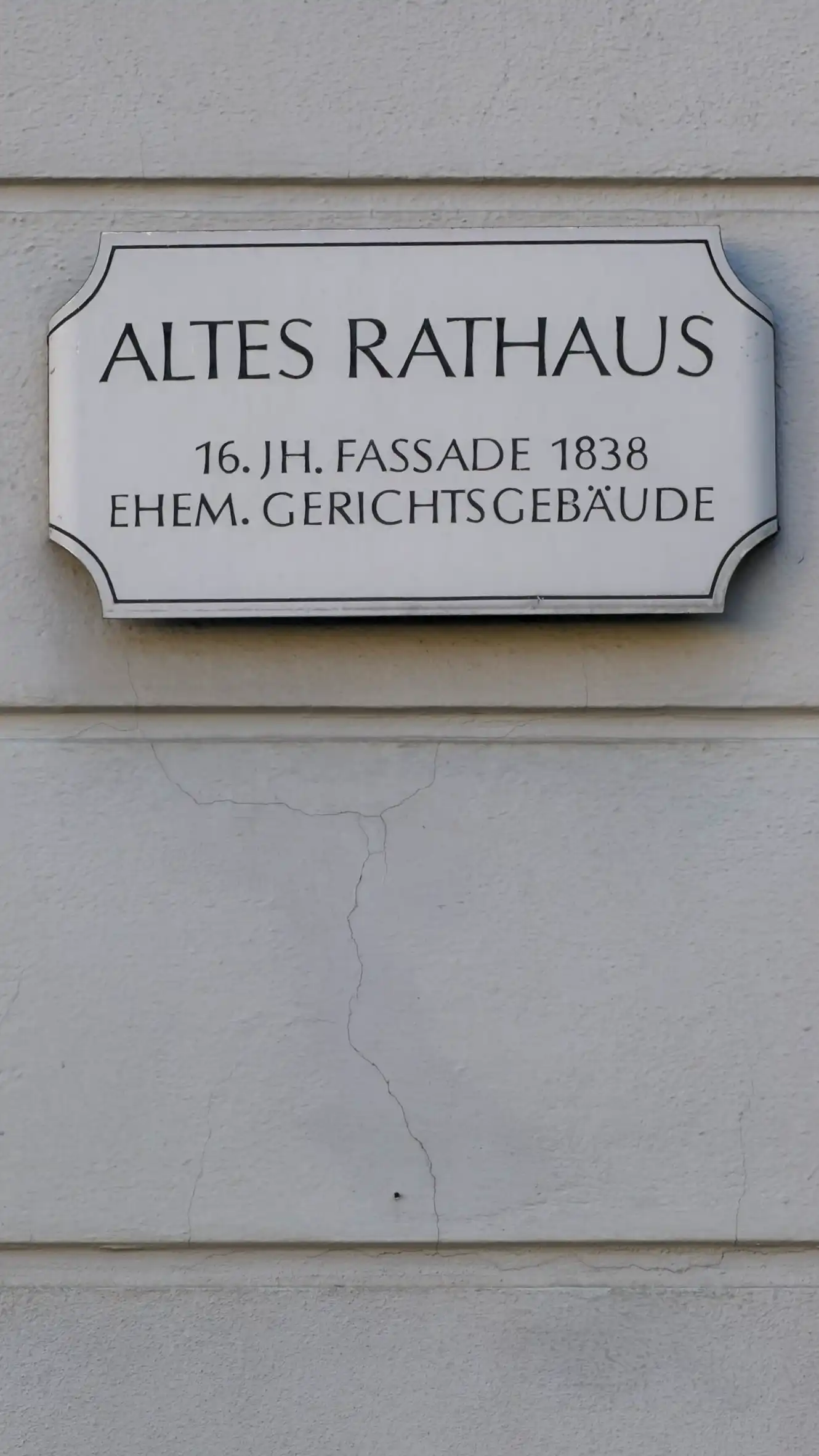 Wall-mounted information plaque