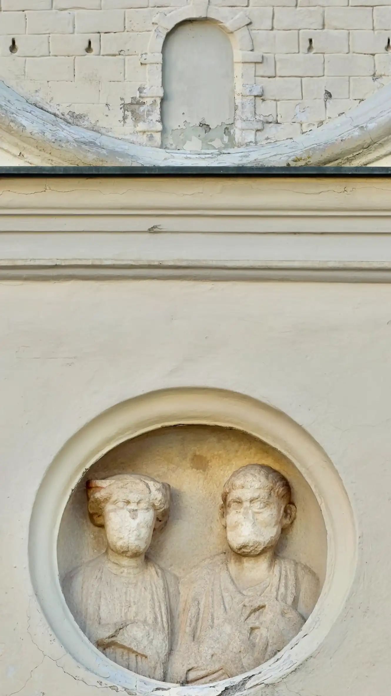 2nd-century Roman-period funerary medallion, depicting a married couple
