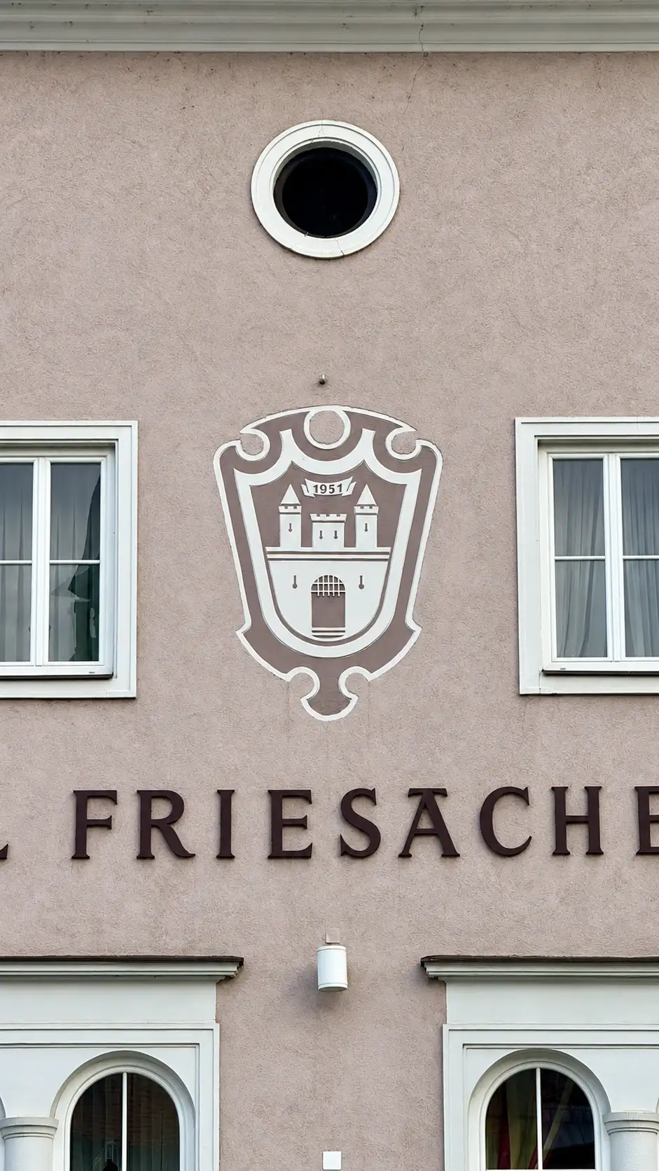 Ocular window and plasterwork heraldic shield