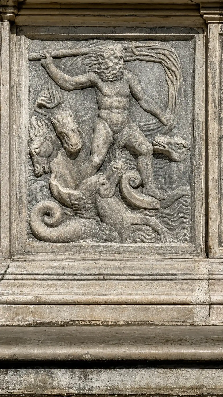 Poseidon emerges from the sea with his four horses.